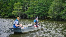 In a row boat on Chicot Lake in Arkansas fishing for catfish.