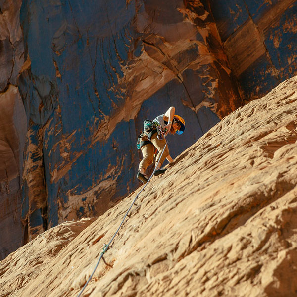 Kylie Fly rock climbing scenic.