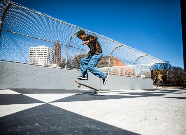 Skateboarder does a trick