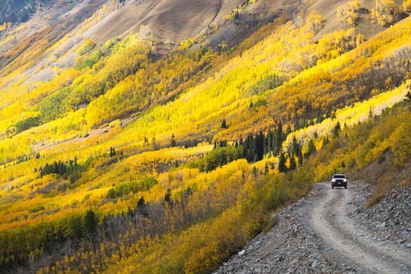 A mountain pass with a car