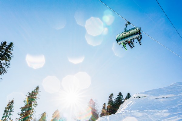 ski lift dangling skier dangles
